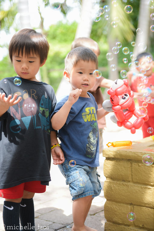 This would be my son PUNCHING the bubbles. Of course.