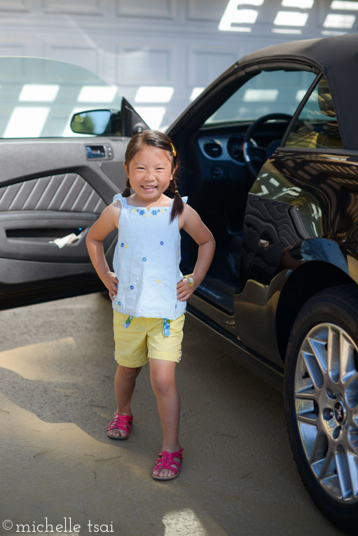 In the blink of an eye, she was dressed and waiting by the car.