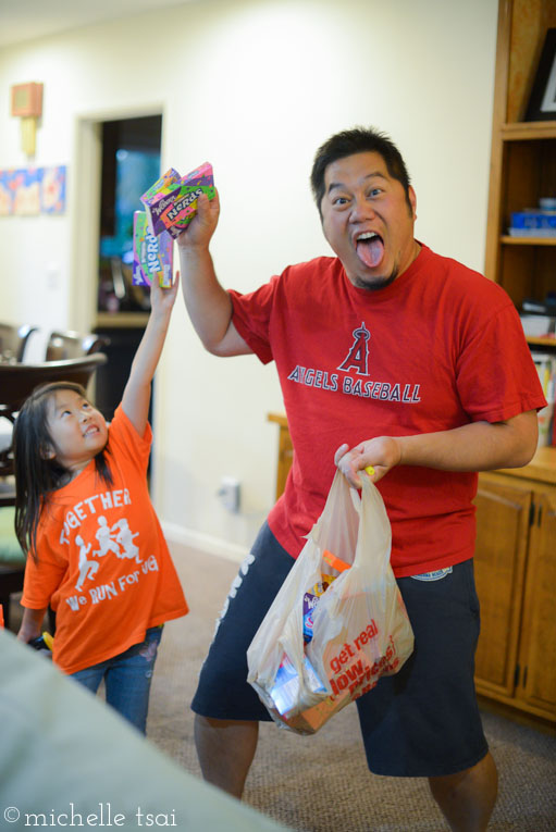 Meanwhile, the dad and little sister were doing this in the living room. I do not know what exactly this is though.