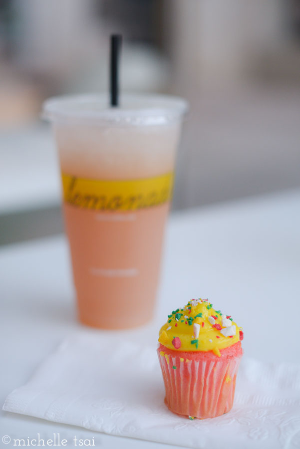 And because there's something seriously wrong with us (or because those green beans were seriously so salty that we were dying of thirst), we stopped in for some watermelon rosemary lemonade and this irresistibly cute strawberry lemonade mini cupcake. The only thing I can say in my defense is that it was least mini.