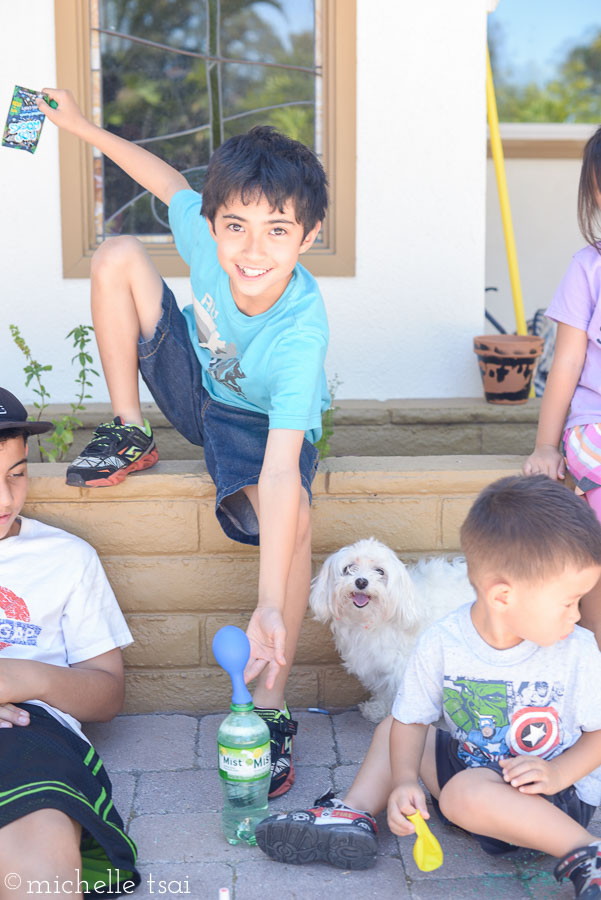 There's so much going on in this picture, but I love it anyway. It pretty much sums up how chaotic kids+candy+soda+dog can get.