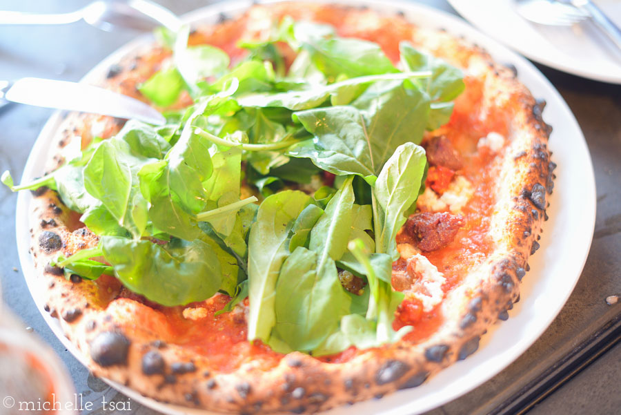 Salsiccia. housemade lamb sausage. san marzano tomatoes. ricotta. arugula. fermented chilies. 