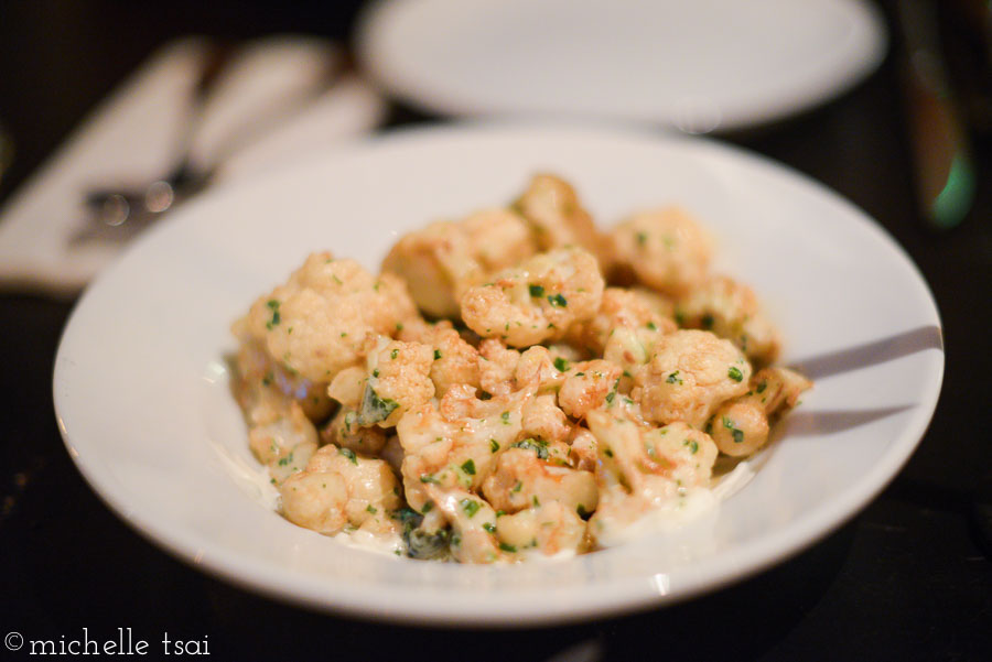 Fried cauliflower dressed w tahini & herbs, labne, pomegranate molasses.