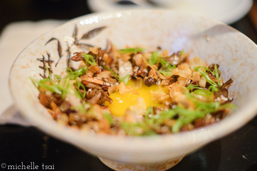 Wild mushrooms, rice porridge, scallions, garlic chips, egg yolk.