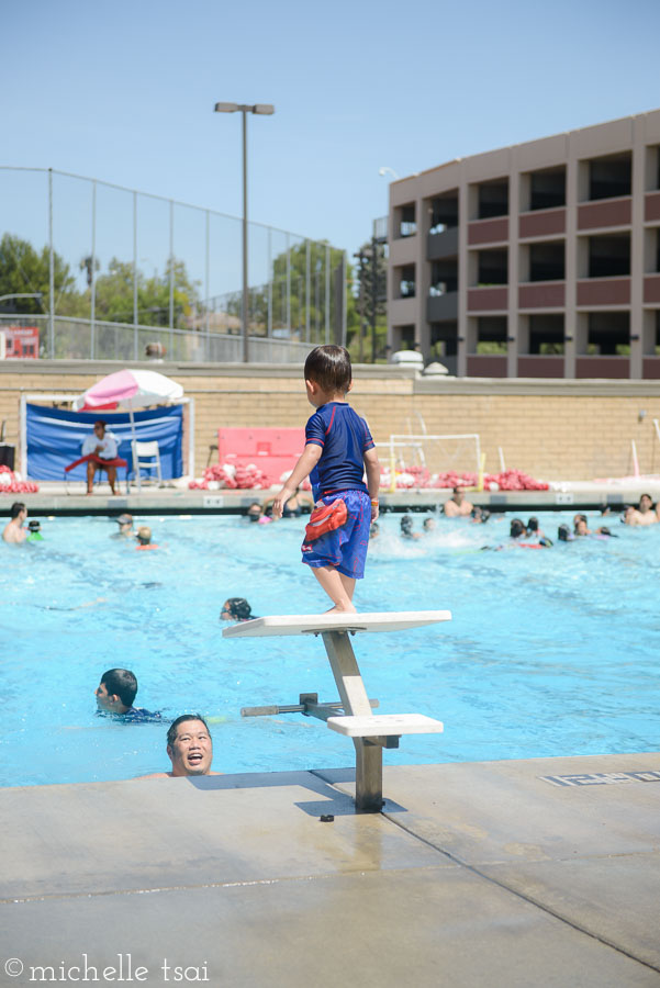 He kept wanting to jump off the diving board like the big kids, but wasn't allowed to since he doesn't know how to swim yet.