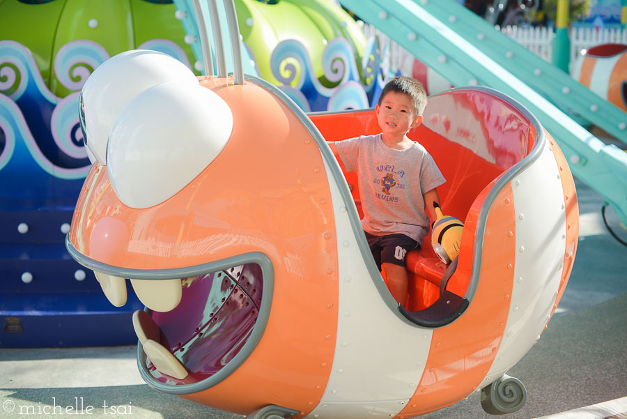 Poor little brother wasn't big enough to ride the minion ride so had to make do with this little bug ride. Over and over and over.