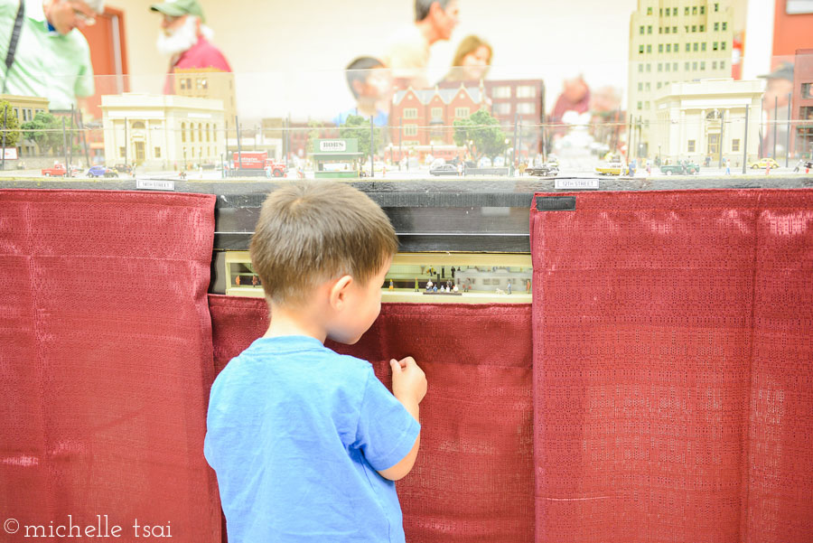 Our little guy was too short to be able to see the train tables unless someone picked him up. Except for this one little viewing window of a subway train running underneath the trains above. Perfect height for him.