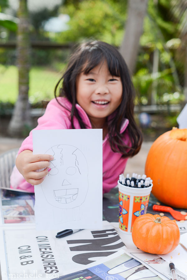 This year we had the kids draw their own pumpkin faces instead of doing the initially-looks-simple-but-ends-up-being-really-complicated designs from the internet. (I'm looking at you, Cinderella.) (Also, you may have noticed the girls' hair has some leftover curl in it and further may have assumed they're from the day before and haven't been washed out yet. Please feel free to instead think that I am the kind of mom who has curled their freshly washed hair for the second day in a row, instead. Thank you.)