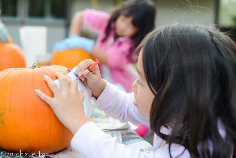 Pumpkin face outline hole poking is serious business, man.