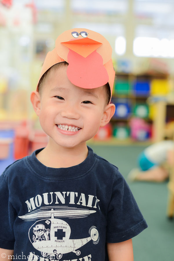 He lost his turkey hat at recess before I got there and was very, very sad that he didn't get to show it to me. So we appealed to his teacher, and she, being very patient and kind, and having an extra turkey hat, plopped this one on his head. He was just a little happy about that. Okay, it probably made his whole Thanksgiving weekend.