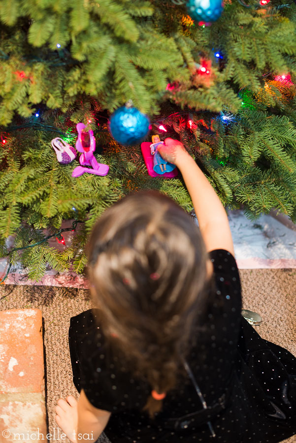 This one found a little shelf in the tree to hold some of her favorite toys. She also claimed they made good ornaments, too.