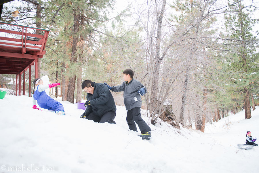 He'd run up with two snowballs in his hands, toss one to his dad and say "Catch!" and then immediately pelt him with the other snowball. It was his best tactic.