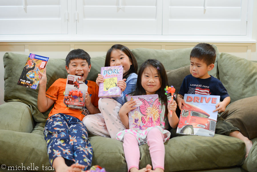 Aaaanywho, we let them open the gifts they bought for each other. They chose to shop their school's book fair this year. Jonah is having big, bad feelings about the jiggly bead pen his sister got but he did not. Everyone else is pretty pleased with their gifts.