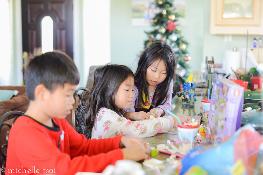 Awake for a couple hours already (having been tended to by Grandma who supplied them with milk and something to eat for the little guy who has low-blood-sugar-cranky-butt issues) and hard at work building the girls' Lego sets.