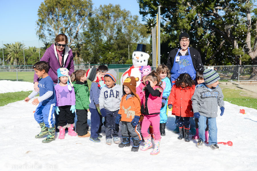 This is what you get when you combine a bunch of preschoolers, the novelty of snow, and someone off camera tossing some snow at them. I love it.