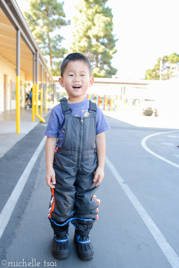 After several more rides on the sled with his buddy, it was finally time to head home. Trudging along in his heavy snow boots. This is his "I'm hooooooot, Mommy" face. Only in California.