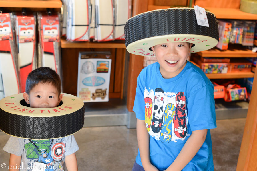 Mikey could not be convinced to ride the Radiator Springs racers and Jonah was too small for it, so the girls and I went while Daddy and the boys waited for us. They found creative ways to pass the time.