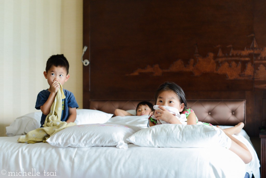 Lounging around watching cartoons in the hotel room. Quite possibly their very favorite part of vacationing.