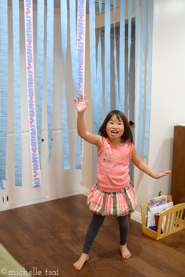 The kids tested out the fancy party streamers we hung up to surprise Daddy with.