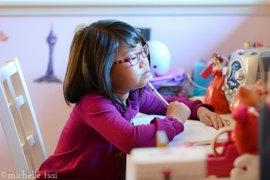 I wanted to get some pictures of her the day she got her glasses and found her in her usual thinking spot.