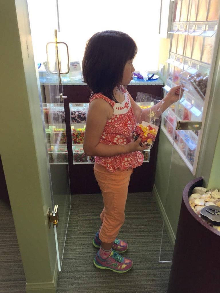 And before I knew it, she was already in the candy closet!