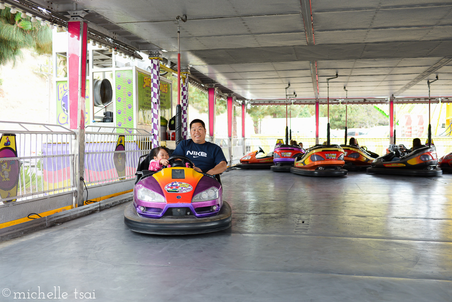 A brave man to let the little girl take the wheel.