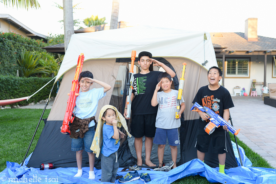 The boy crew at attention in front of their lodging for the night.