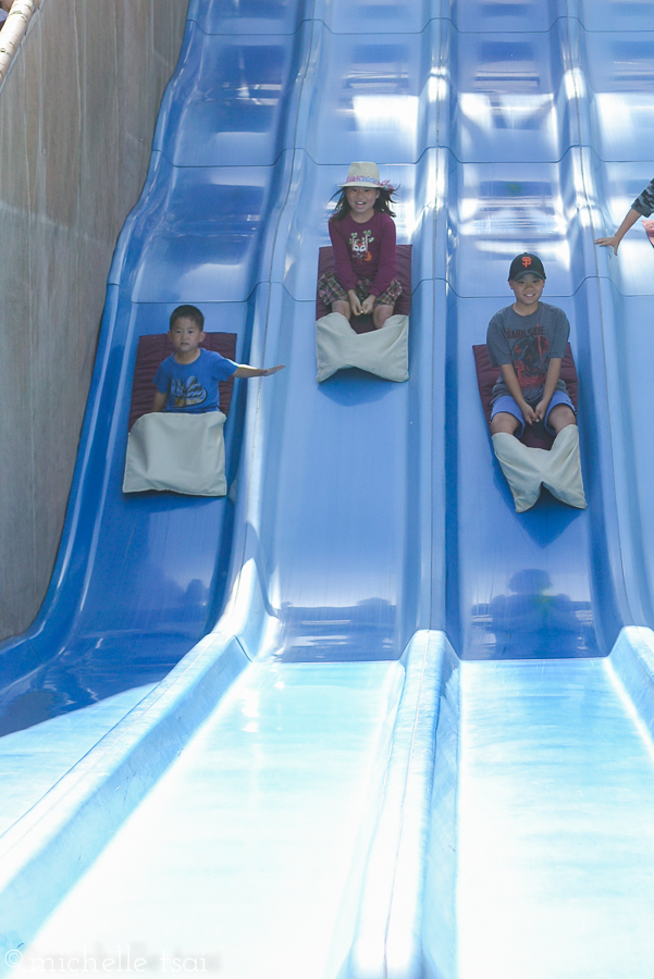 These guys have never met a giant slide they didn't like. Btw, Lauren went by herself with the next round of kids. Somehow there was a mix-up and some other kids pushed in front of her and she got separated from her sibs.