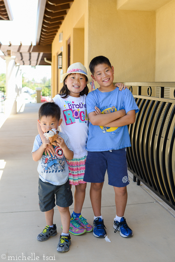 This sweet sister wanted a pic with her brothers of whom her shirt speaks.