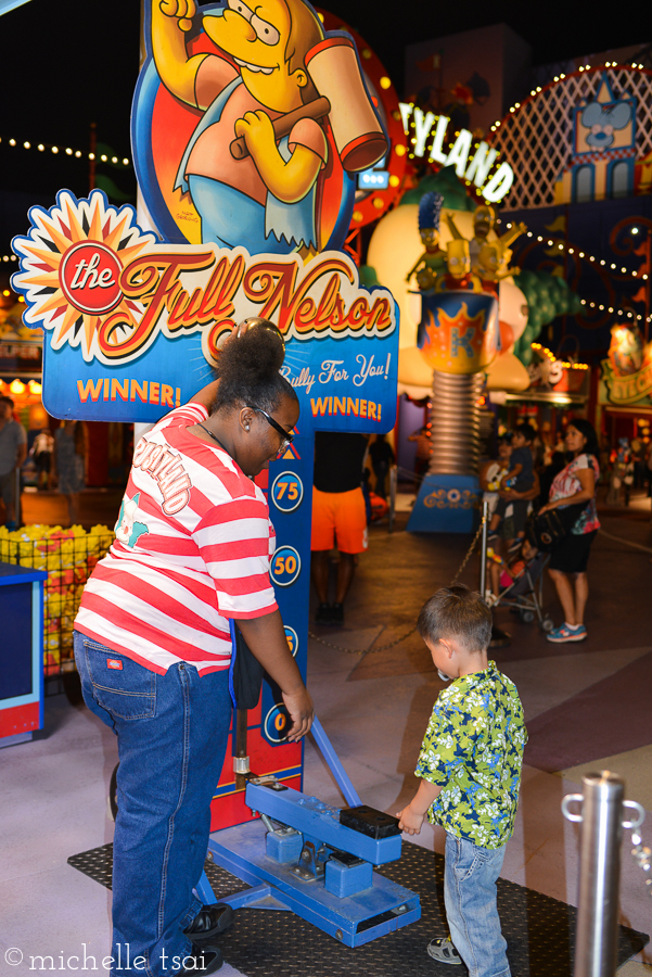 Then the older kids and I hopped on the Simpsons ride while the daddy and Jonah found more ways to pass the time.