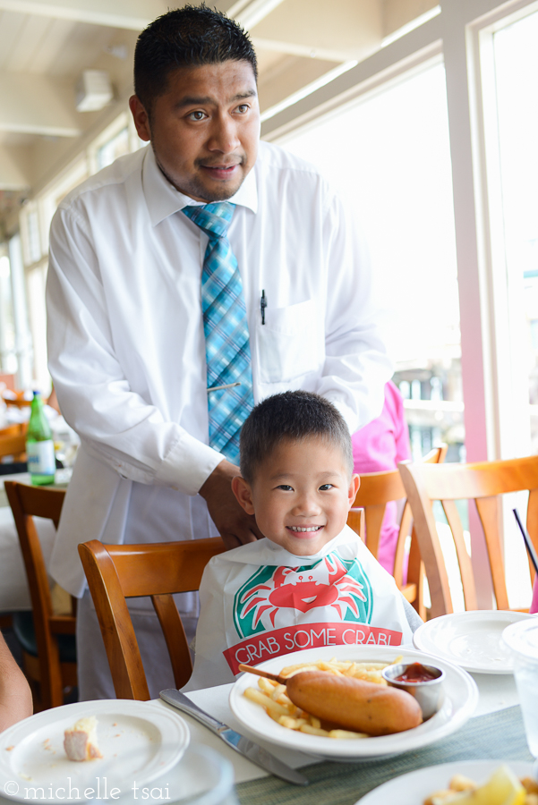 This boy just wanted the bib his brother got.