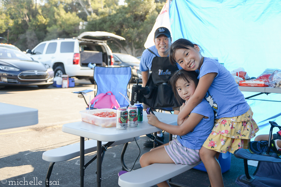 Sisters. And their photobombing Daddy.