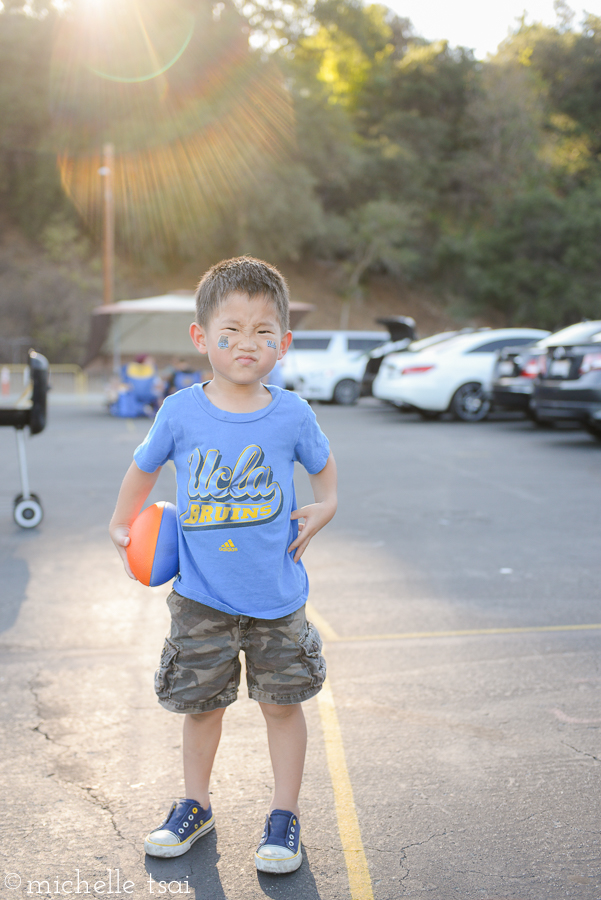 Here's this boy not caring a whit about the fact that we've entered the golden hour with the pretty light that mommy wanted to get a picture of him in.