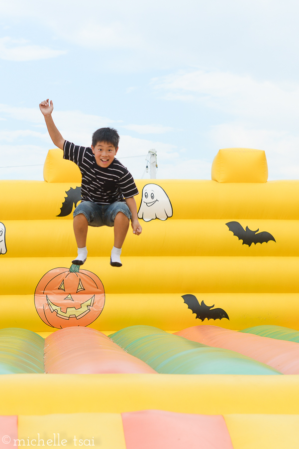 Thankfully he's not too old for some good ol' bounce house fun.