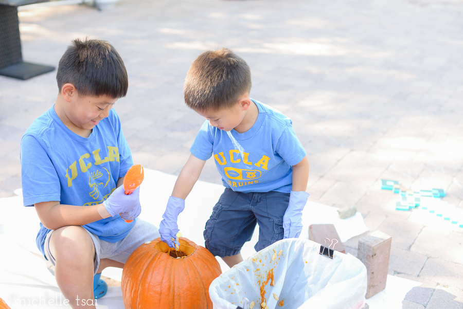 I don't remember now how it was decided, but the boys ended up with the normal sized pumpkin we got from Walmart for $3. Why oh why didn't we buy two at the time?!