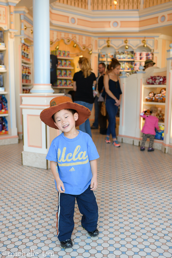 He got a thing for Disneyland hats.