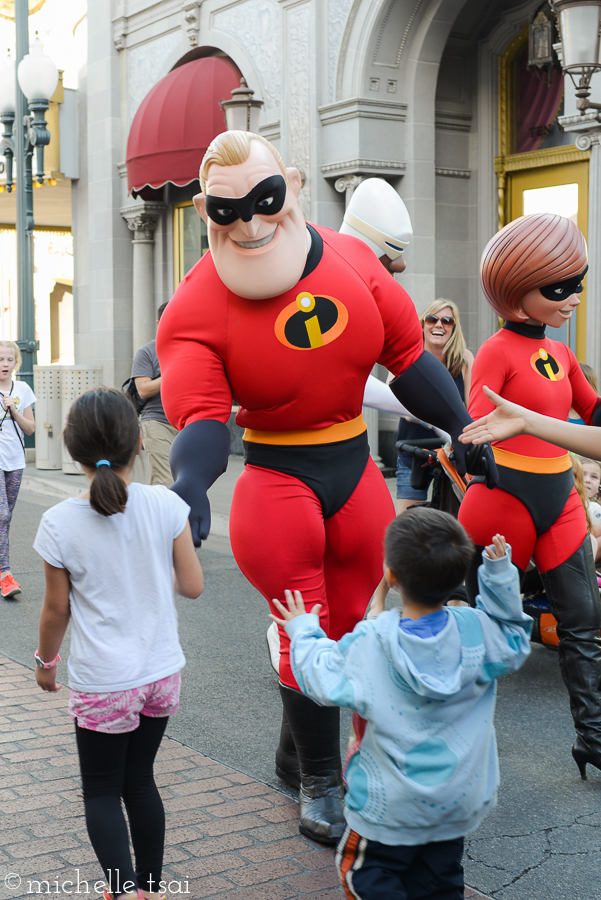 Slapping Mr. Incredible some skin, er glove.